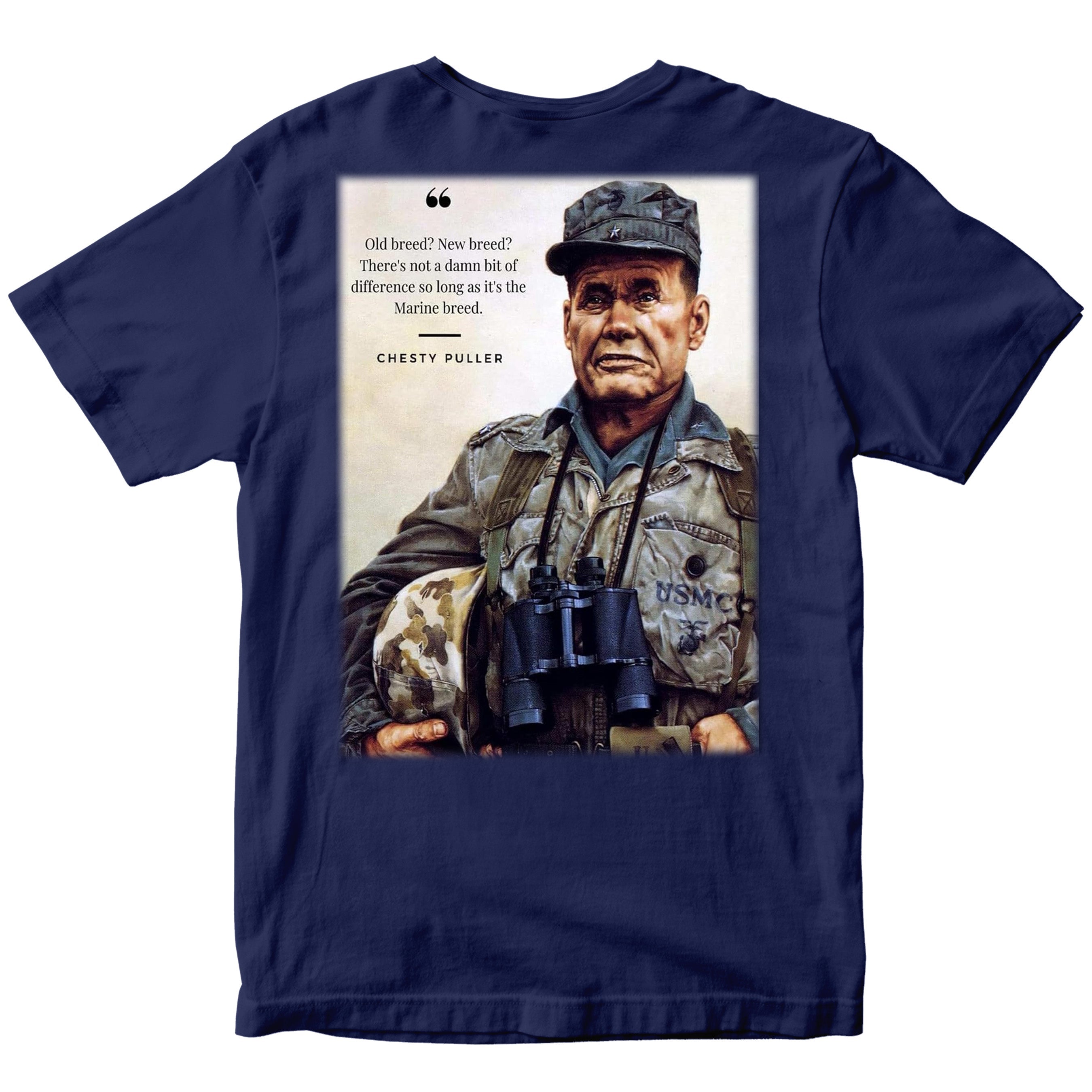 Marines navy T‑shirt showing a color portrait of Lt. Gen. Chesty Puller holding a helmet and binoculars, with the quote ‘Old breed? New breed? There’s not a damn bit of difference so long as it’s the Marine breed.’ and ‘Chesty Puller’ below.”